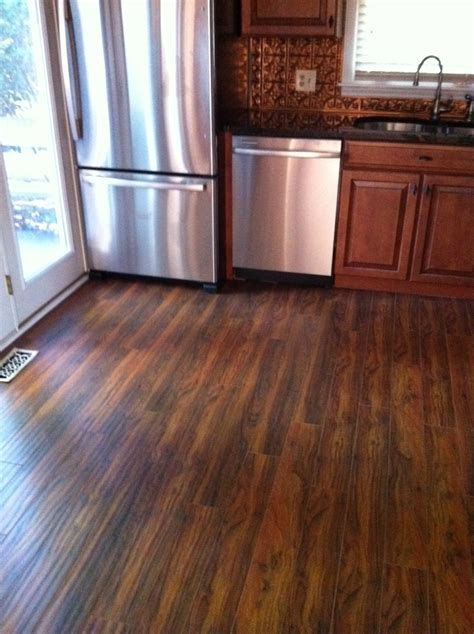 Hardwood kitchen floors pros and cons. Hardwood floor vs Laminate: The Pros and Cons - HomesFeed