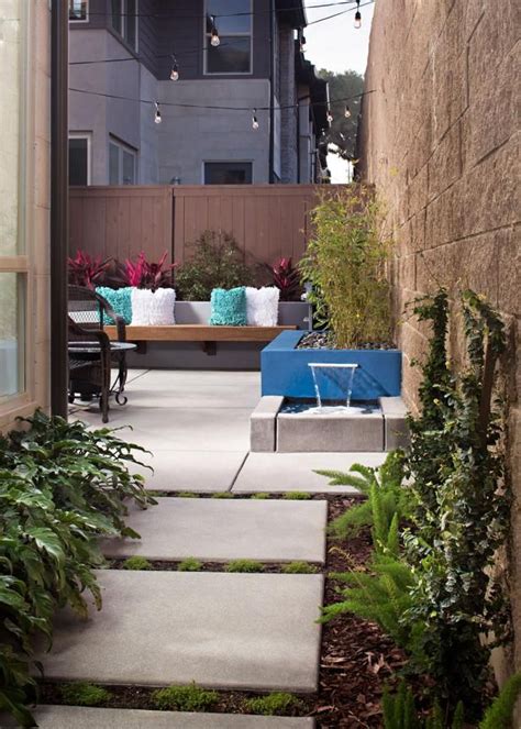 Hgtv This Small Backyard Features A Blue Block Planter With A Water