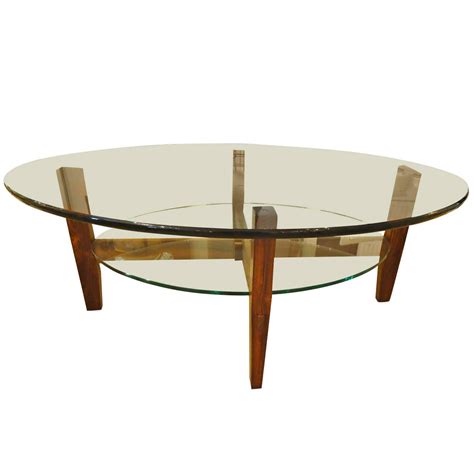 Add style to your home, with pieces that add to your decor while providing hidden storage. Two Tier Rosewood and Oval Glass Coffee Cocktail Table at ...