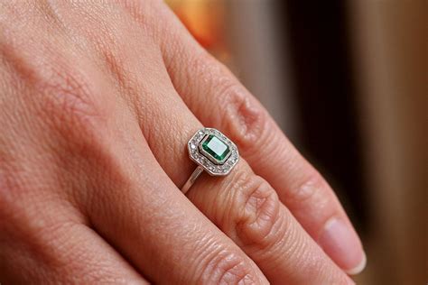 To bring out the bold colors of art deco, rings contained colored stones like emerald and sapphire set next to diamonds. Art Deco Emerald Ring - Antique Emerald & Diamond 18ct ...