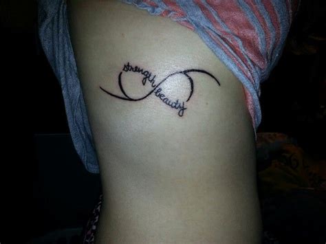 Rib Tattoo Strength And Beauty Tattooed In My Moms Handwriting Tattoo Strength Infinity