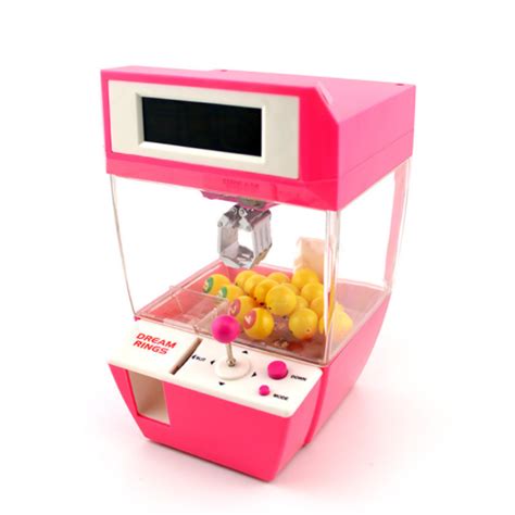 Your doll machine stock images are ready. Buy UFO Catcher Claw Machine Mini Doll Candy Grabber Dolls ...