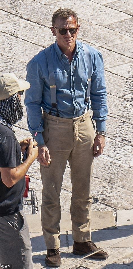 Billy reid supplied twenty coats for the bond 23 production: Daniel Craig's stunt double films death-defying explosion ...