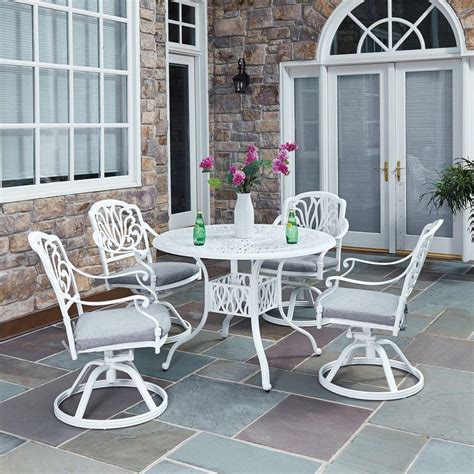 Patio with wood table set and heat lapm. Home Styles Floral Blossom White 5-Piece All-Weather Patio ...