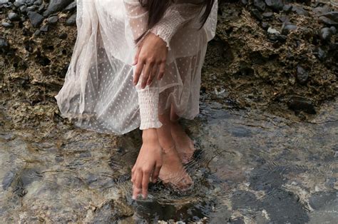 Woman In White Dress Standing On Water · Free Stock Photo