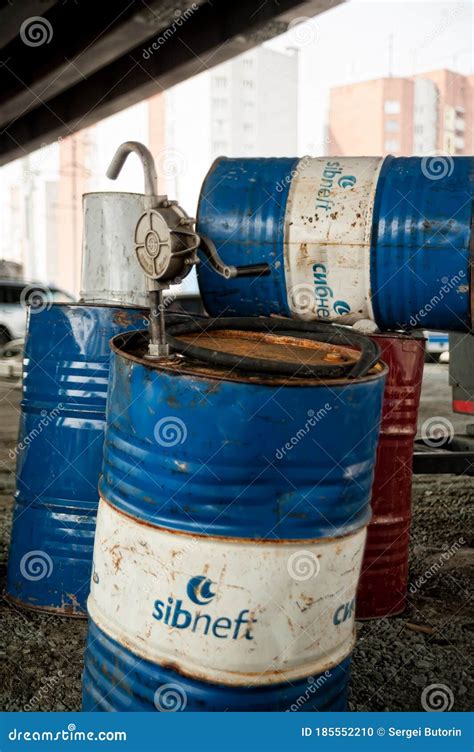 Barrels Of Gasoline And Pump On Construction Site Editorial Image