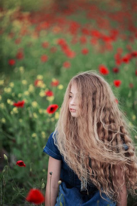 Girl In A Field Of Poppies By Stocksy Contributor Jovana Rikalo Stocksy