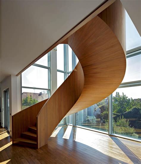 Concrete Circular Stairwell Focus Of Minimalist Residence Interior