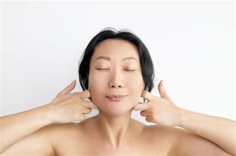 Asian Woman Doing Face Building Facial Gymnastics Self Massage And