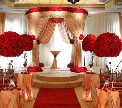 Set in an attractive pedestal bowl, this breathtaking faux floral and feather design. Beautiful red rose decorated Jewish wedding ceremony