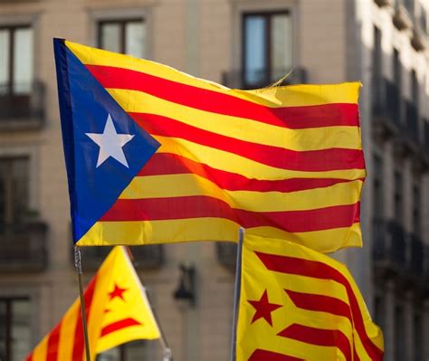Free Photo Flying Catalan Flags