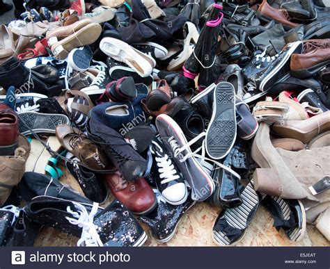 Pile Of Used Worn Secondhand Shoes For Sale Lots Stock