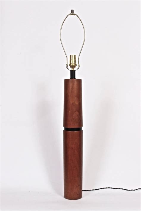 Maybe you would like to learn more about one of these? Tall ESA Danish Modern Teak and Black Leather Sleek Barrel ...