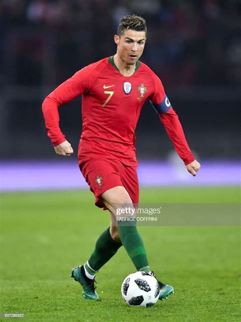 Portugals Forward Cristiano Ronaldo Controls The Ball During An