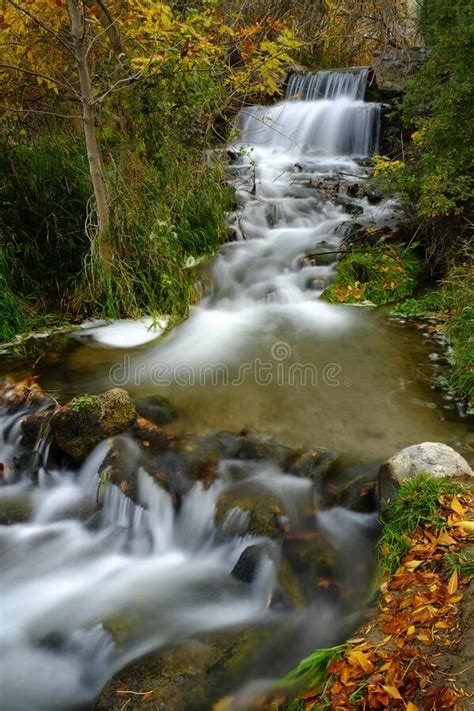 Waterfall Flowing Water Stream Creek With Fall Autum Leaves Stock Image