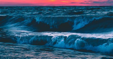 Ocean Waves Crashing On Shore During Sunset · Free Stock Photo