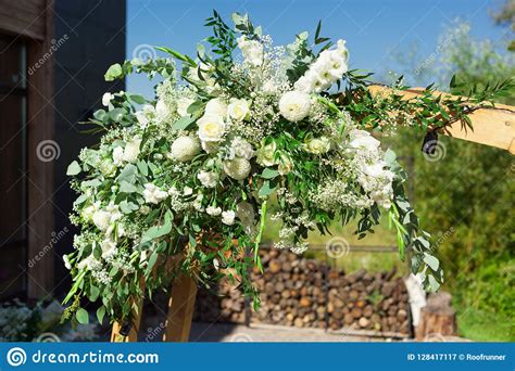 Part Of Beautiful Round Wedding Arch Decorated With Flowers And