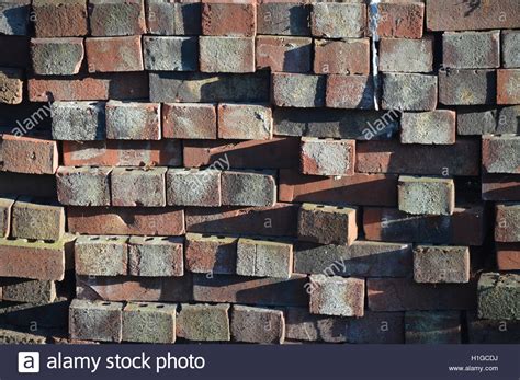 A Stack Of Used Red Bricks Stock Photo Alamy
