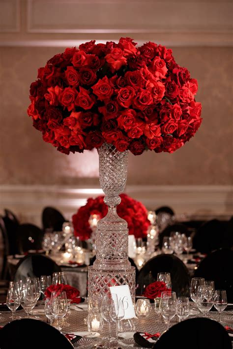 Tall Red Rose Centerpiece On Round Table