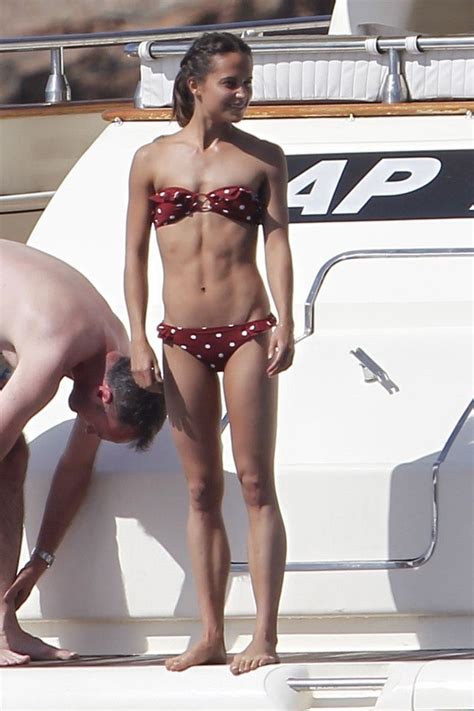 Alicia vikander stunning legs in a short red dress and. Alicia Vikander Sizzles in Red Hot Polka Dot Bikini as ...