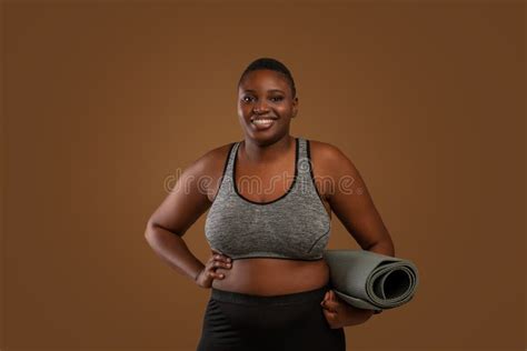 Chubby Black Woman Holding Yoga Mat At Studio Stock Photo Image Of