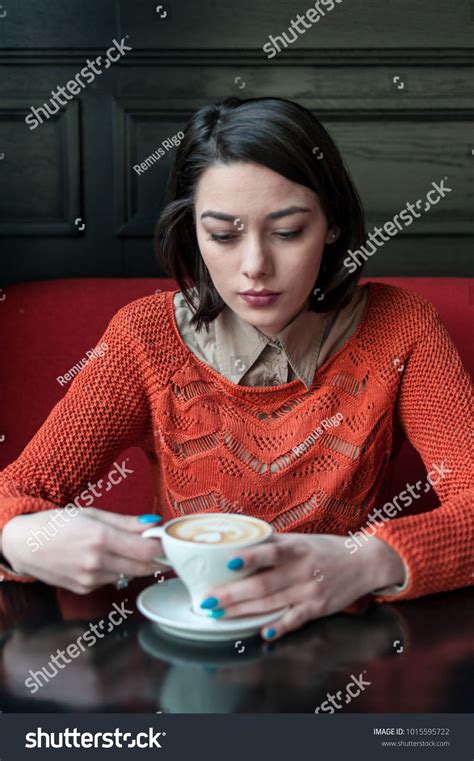 Woman Sitting At The Table And Drinking Coffee Real Poeple Female