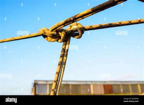 Closeup Stretched And Tied Industrial Braided Rope Stock Photo Alamy