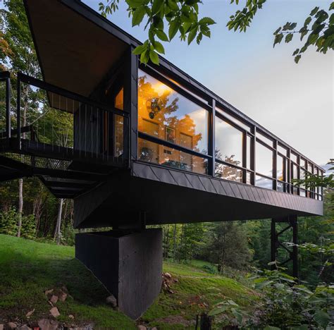This Dramatically Elevated Cabin Sits Among The Treetops Architecture