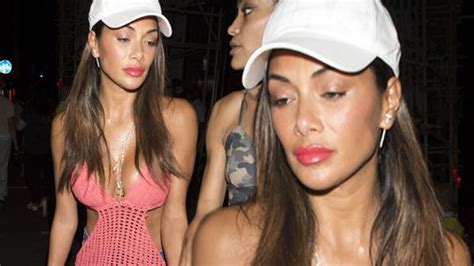 Nicole Scherzinger Looks Worse For Wear As She Flashes Her Assets On