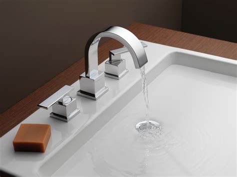 The arrangement is such that the water flows for a few seconds when a hand comes close to the. Faucet.com | 3553LF in Chrome by Delta