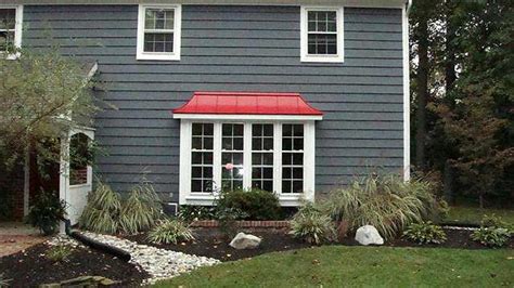 Nw style chicken coop with rustic metal roof, craigslist hen house. Red Metal Roof & dark gray shingles | House Exterior ...