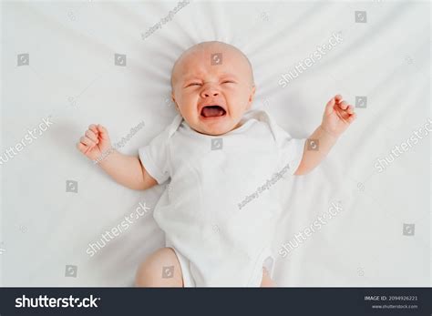 Newborn Baby Cries On White Sheet Stock Photo 2094926221 Shutterstock