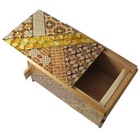 In order to open a japanese puzzle box, you need to move/slide one part (or more) on one side of the box. 5 Sun 10 Steps Koyosegi - Japanese Puzzle Box | eBay
