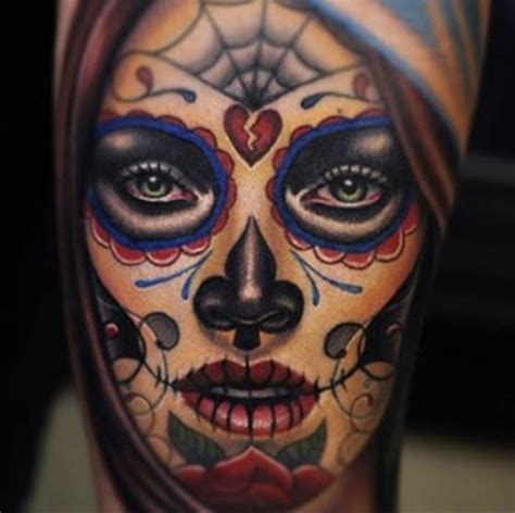 Mexican tattoos for mafia men highlight the theme of violence with designs of traditional wood handled pistols, rifles, and skull shapes. Yallzee's Sugar Skull Tattoos - Tattoo Ideas, Artists and ...