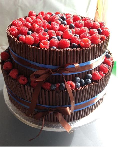 Chocolate Cake With Cigarellos And Fresh Fruit Cake Layered With