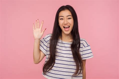 Portrait Of Attractive Pleased Friendly Hipster Woman Waving Hand