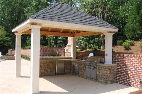A pizza oven and grill are met with sleek countertop which continues arching creating. Outdoor Kitchen - Alpharetta, GA - Photo Gallery ...