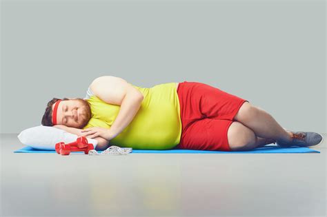 Lazy Fat Funny Man Is Sleeping On A Gray Background The Proactive Athelete