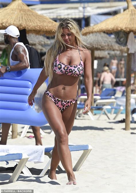 Christine Mcguinness Flaunts Her Tanned And Toned Figure In An Underboob Baring Thong Bikini
