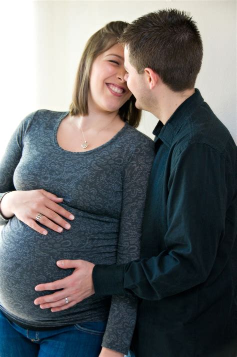 Maternity Portrait Of An Expecting And Excited Mom And Dad