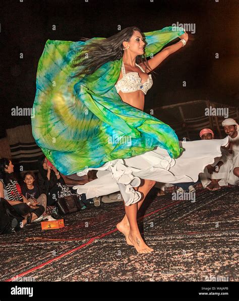 Dubai Uae Belly Dancer Twirls For Guests At Bedouin Desert Safari