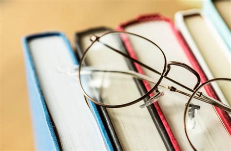 Free Photo A Pair Of Glasses And Books Educational Academic And