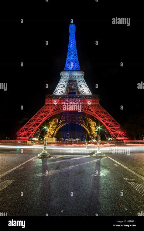 Eiffel Tower Illuminated With French Flag Colors As Tribute To The