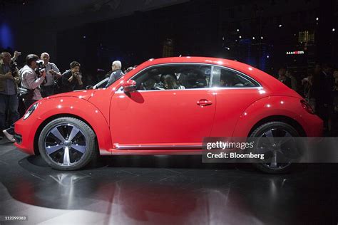 The Newly Redesigned Volkswagen Ag Beetle Is Photographed During Its