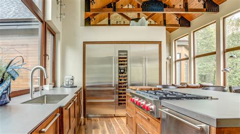 Cabinets are often wood, if not some bright, cheery color. The Geneva: Maple Kitchen Cabinets | Ateliers Jacob