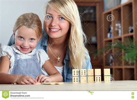Mother And Daughter Playing Dominoes Stock Image Image Of Mother