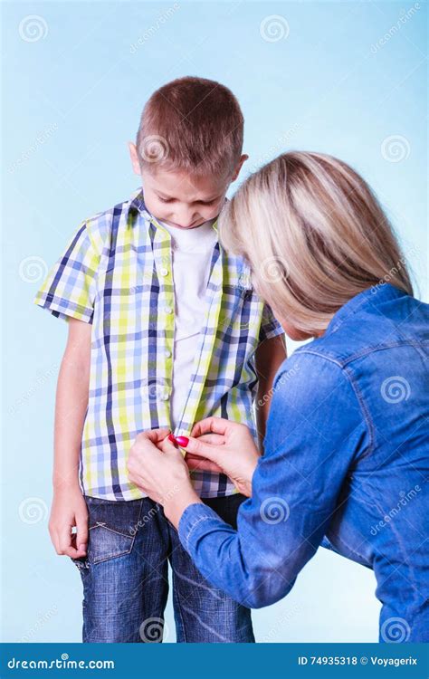 Mother Help Dress Son Fasten Buttons Stock Photo Image Of Wear
