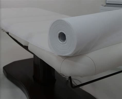 White Disposable Non Woven Bed Cover Roll Perforated Massage Table
