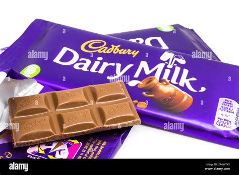 Cadbury Dairy Milk Chocolate Bars Wrapped And Unwrapped Stock Photo Alamy