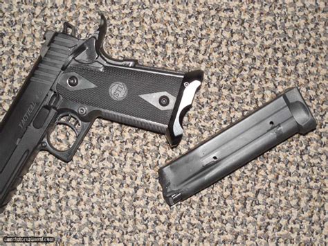 Sti Tactical 40 Model 2011 In 45 Acp 14 Rd Wide Body Pistol Or In 9